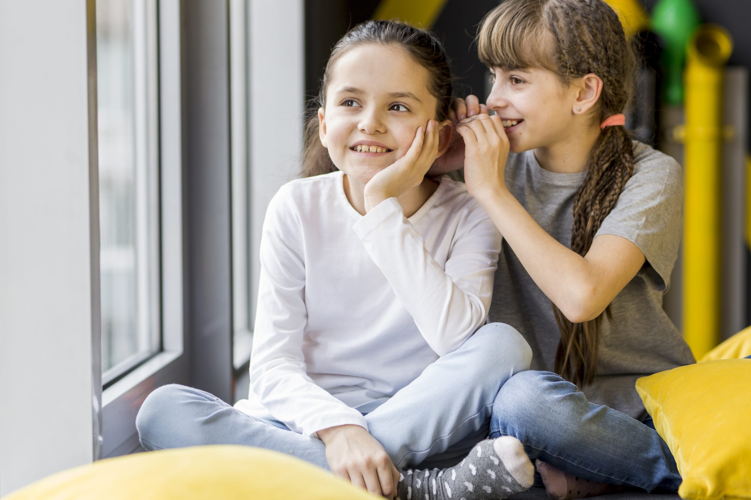 girls-telling-secret